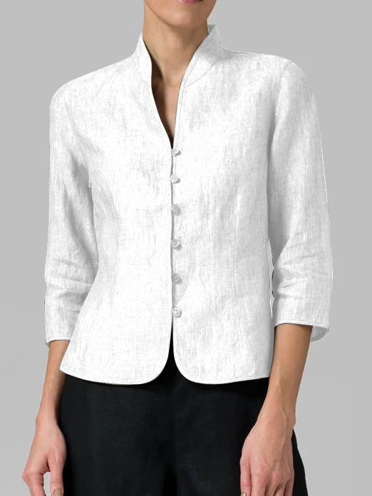 Chic women's elegant blouse featuring a stand-up collar. A versatile long-sleeve top for professional or casual fashion.