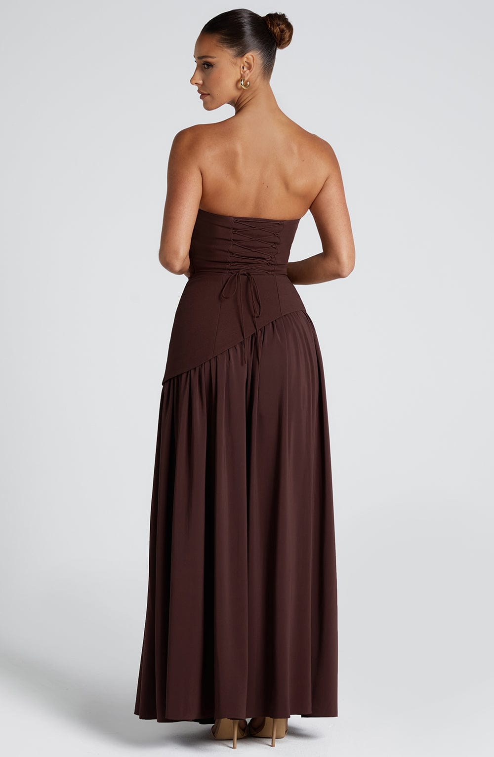 Timeless women's strapless evening gown, long maxi dress with a sophisticated high slit.