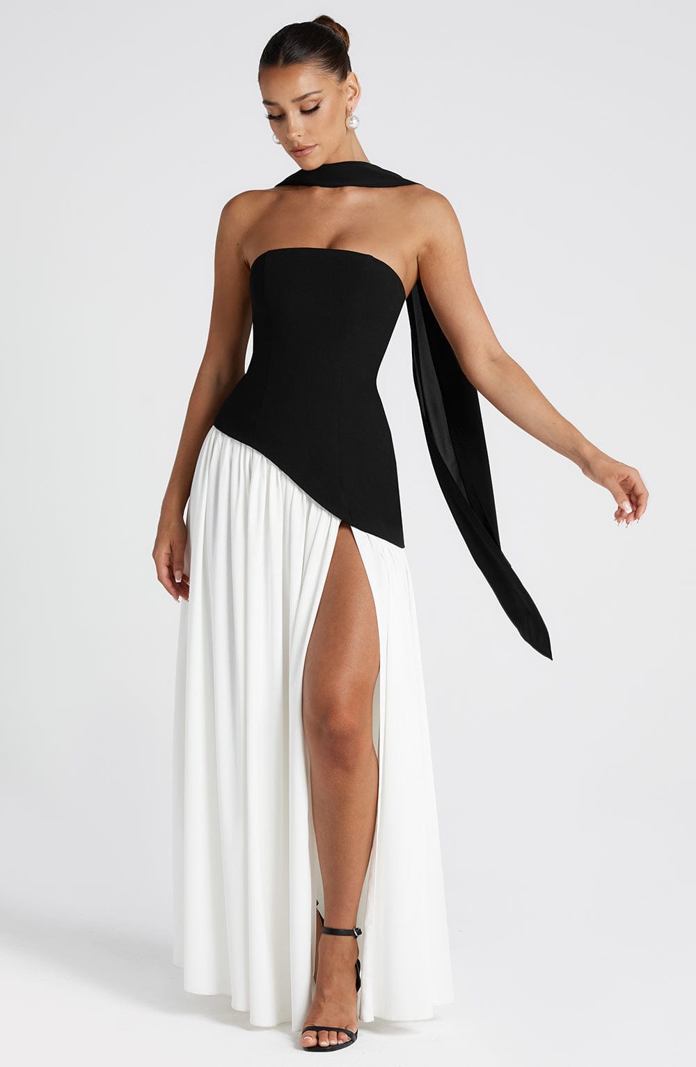 Stylish strapless maxi dress for women, featuring a chic high slit, ideal for summer parties.