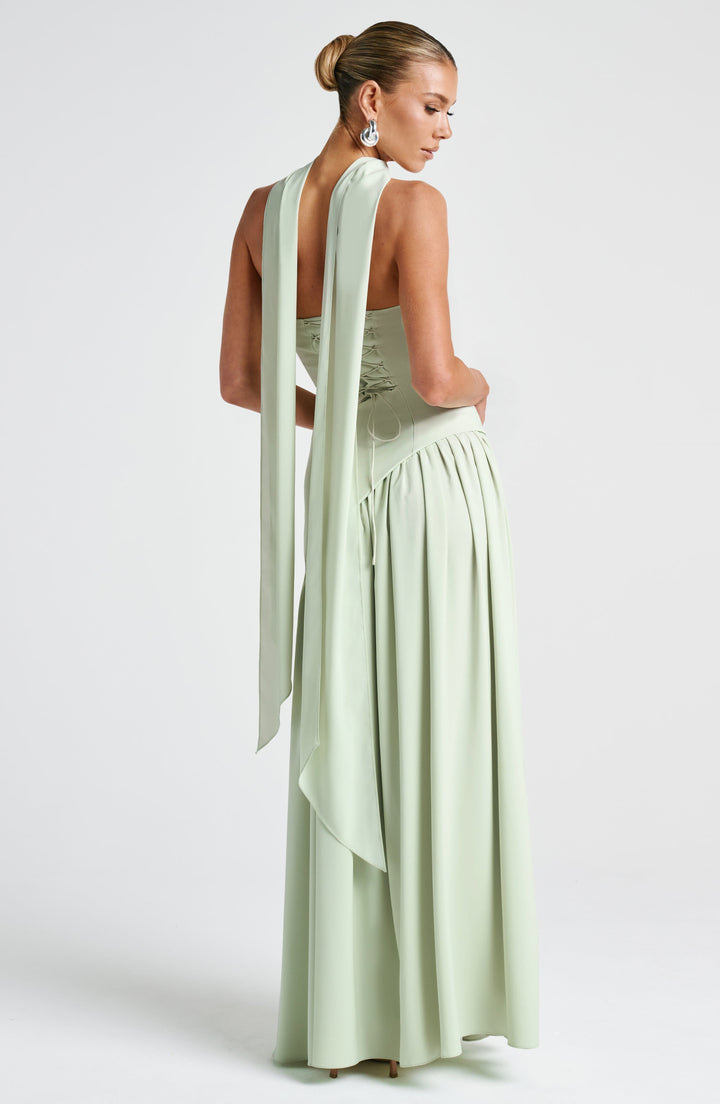 Women's formal strapless maxi gown, elegant for any event, with a beautiful high slit detail.