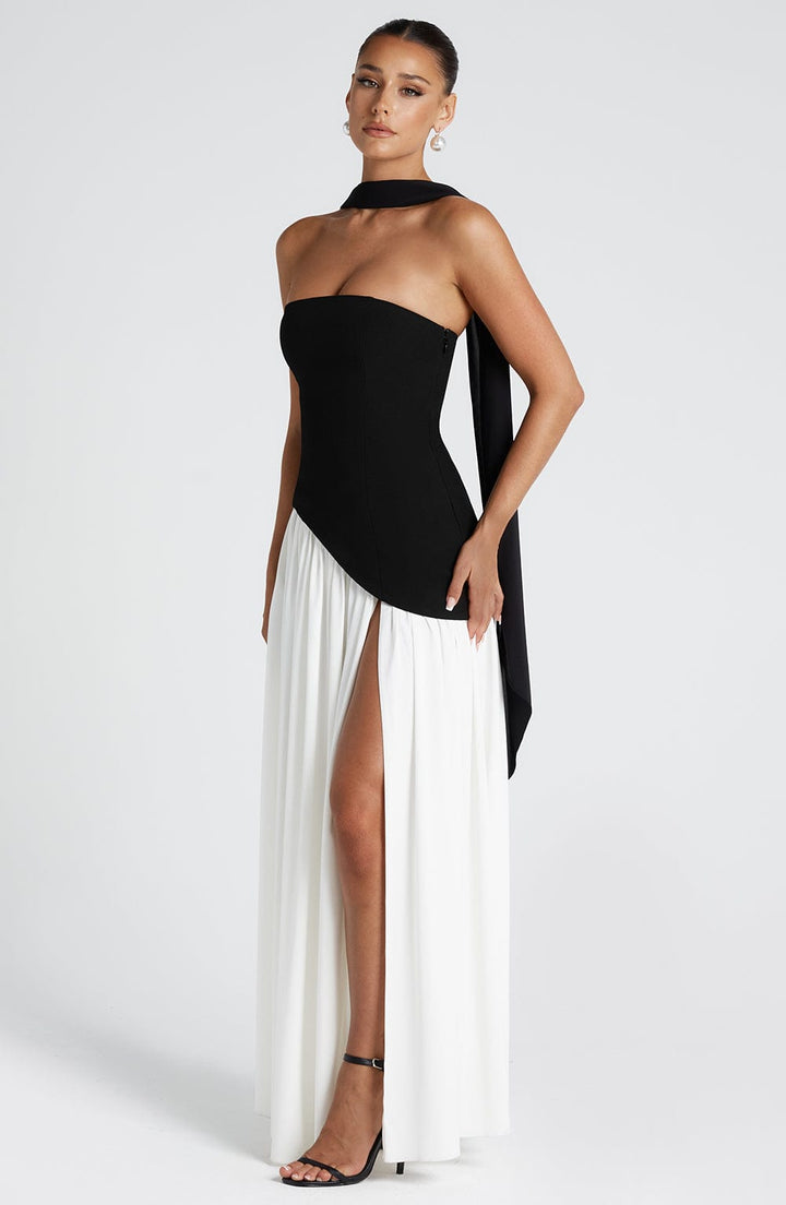 Chic asymmetric maxi dress for women, strapless with a sophisticated high slit, party ready.