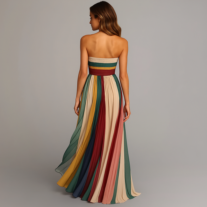 Stunning pleated strapless maxi dress for women, in a flowing striped design, suitable for formal events & parties.