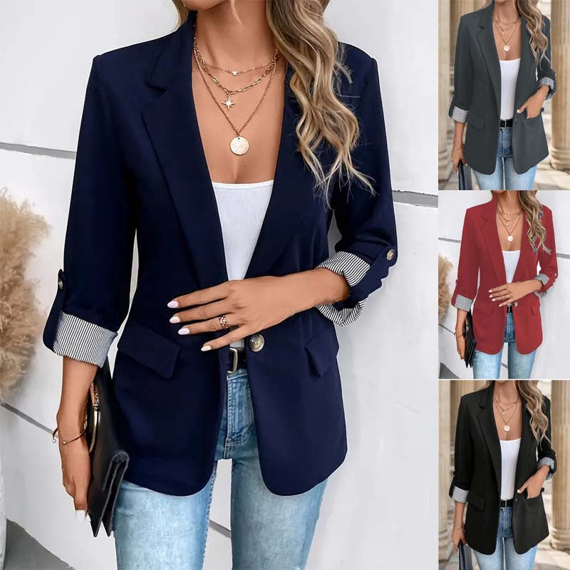 Elegant women's striped blazer jacket, perfect for business casual and office wear. Chic long sleeve fashion outerwear.
