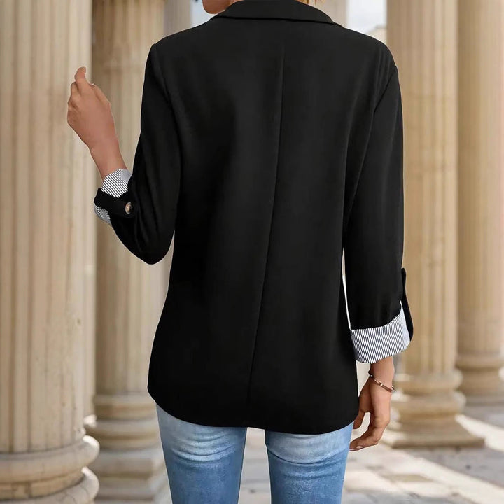 Women's elegant long sleeve striped blazer jacket featuring a classic lapel collar. Ideal for business & chic casual wear.