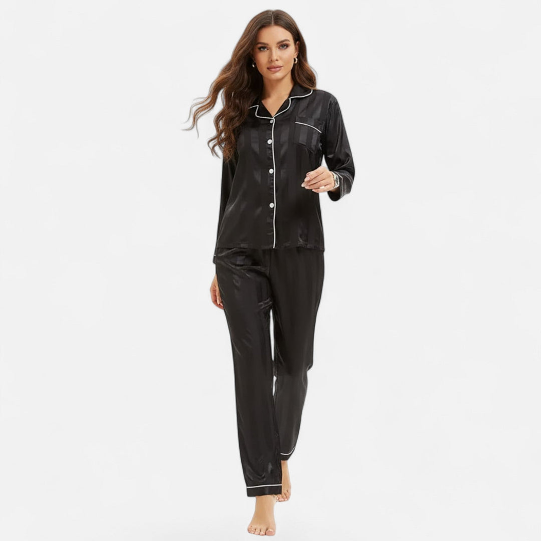 Women's two-piece striped long sleeve pajamas, ideal for relaxed sleepwear & comfort.