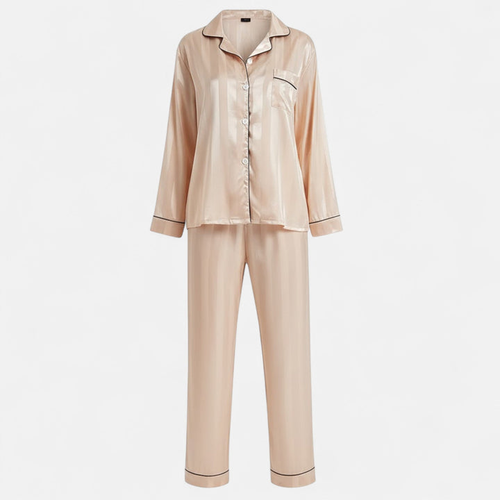 Stylish women's striped two-piece lounge set, long sleeve top and matching pants.