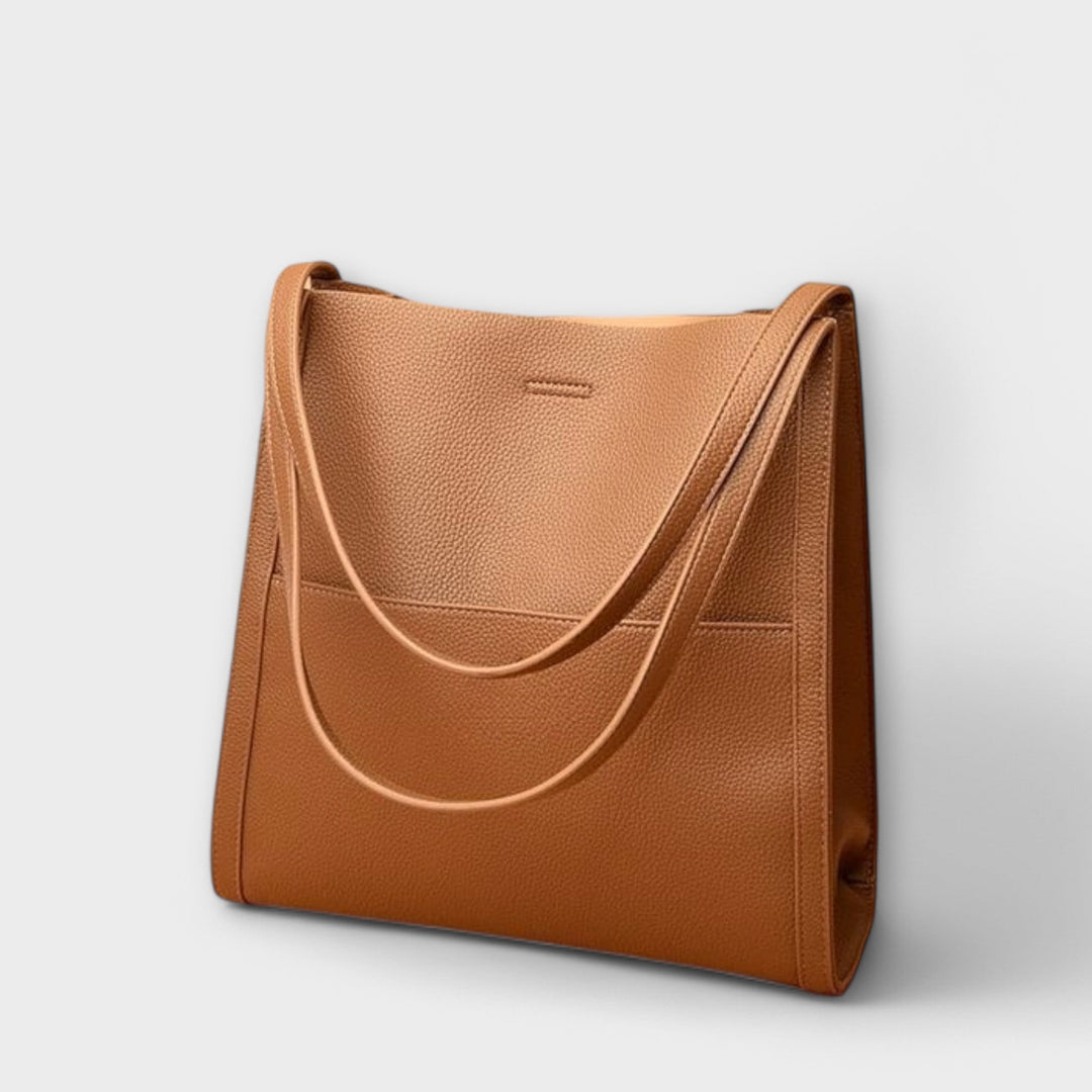 Designer women's structured handbag, showcasing a refined look, an elegant shoulder bag for modern women.