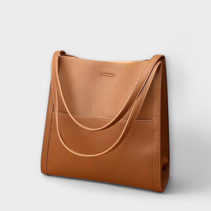 Designer women's structured handbag, showcasing a refined look, an elegant shoulder bag for modern women.