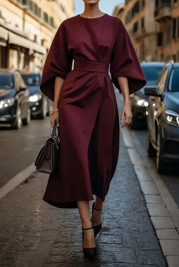 Flowy women's summer midi dress with elegant belt, wide sleeves & flared skirt, perfect for warm weather.