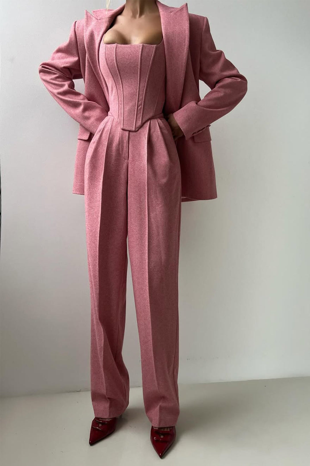 Lightweight women's tailored three-piece suit set, offering elegance for summer business or events.