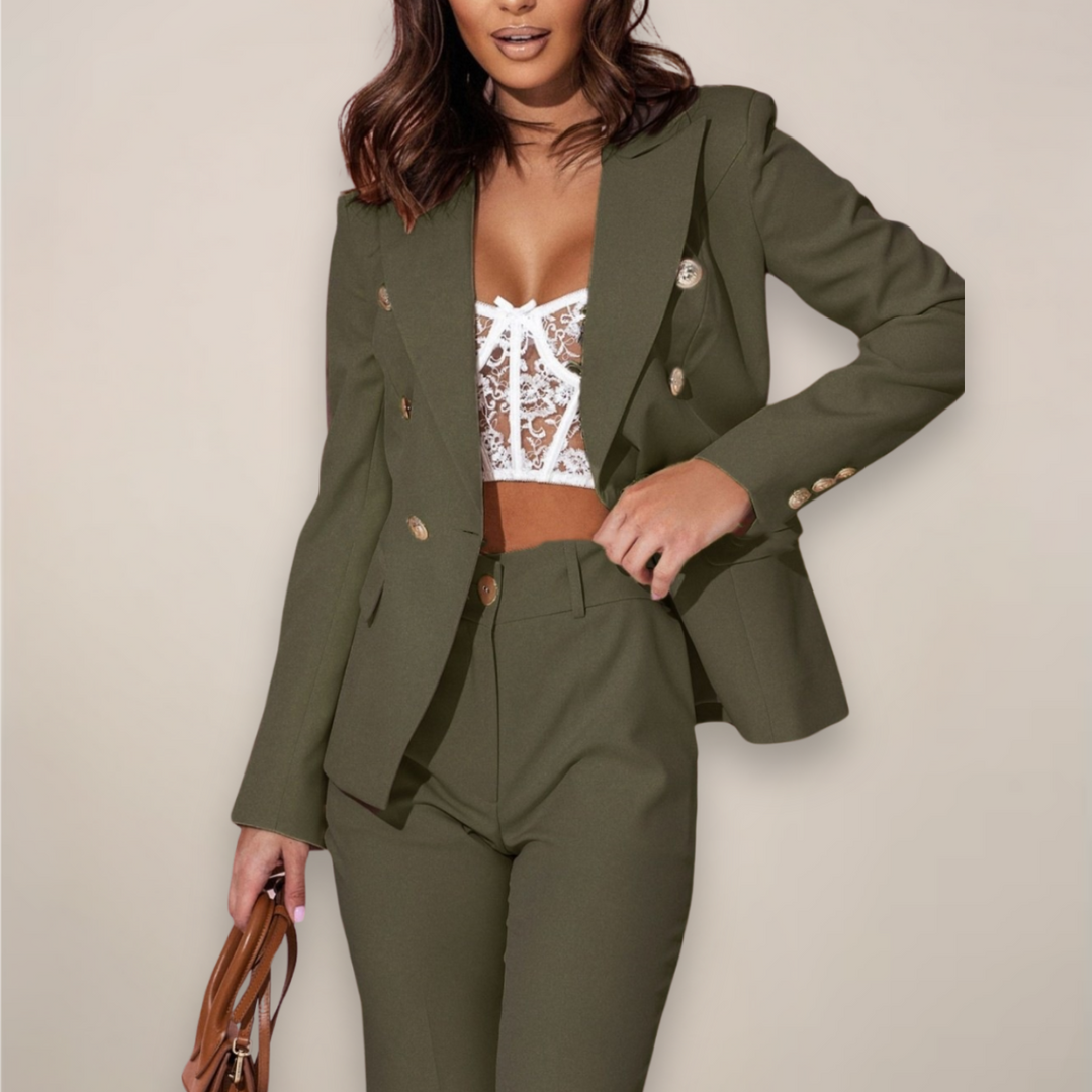 Full-length view of a model in a smart women's tailored pants suit, sophisticated style