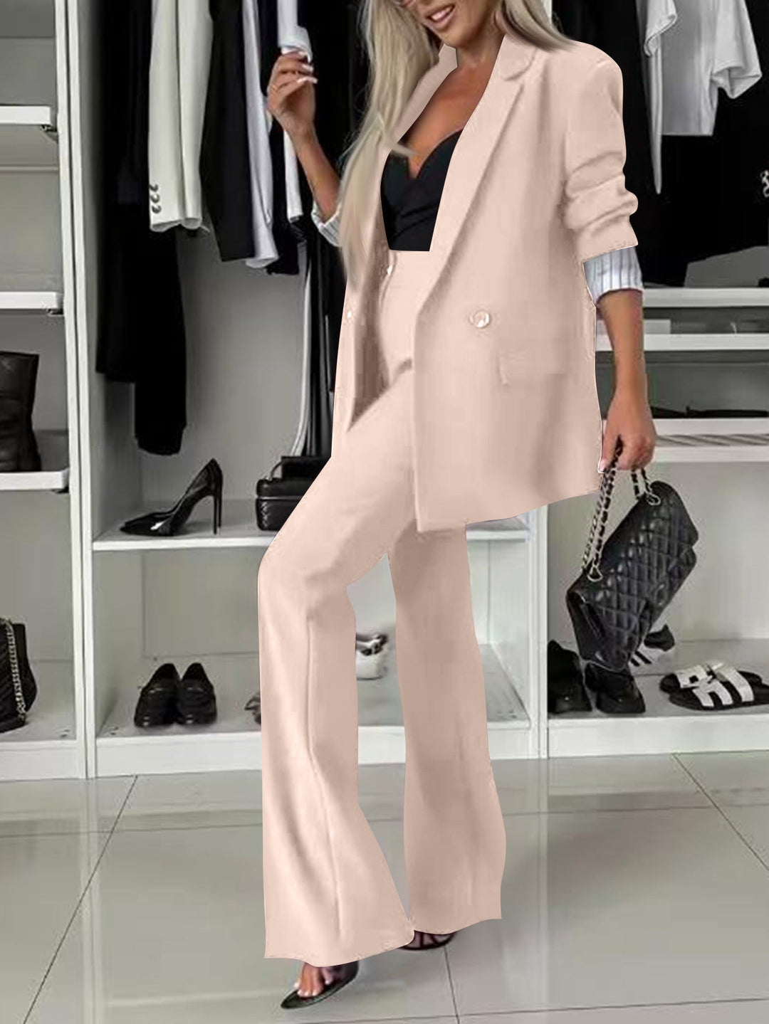 Sophisticated women's modern suit set, featuring a perfectly tailored blazer and trendy wide-leg pants.