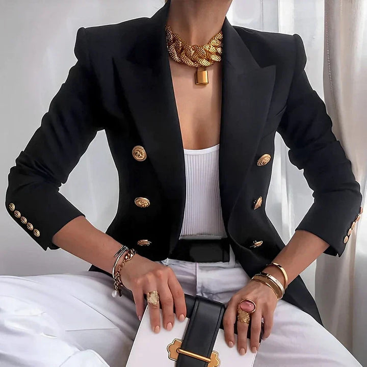 Elegant women's tailored blazer in black with prominent gold button details on front and cuffs for a chic look.