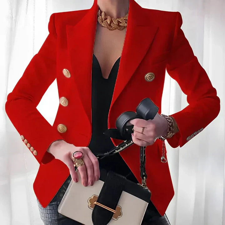 Versatile women's black blazer, expertly tailored with stylish gold button accents, ideal for workwear and professional settings.