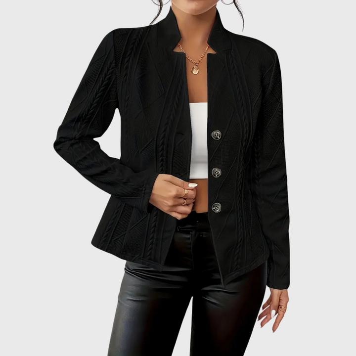 Women's tailored blazer in a light shade, featuring a clean silhouette and elegant details for a modern look.