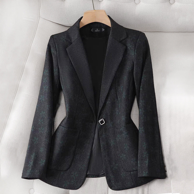 Chic women's black grid pattern blazer, ideal for business casual or fashionable outerwear.