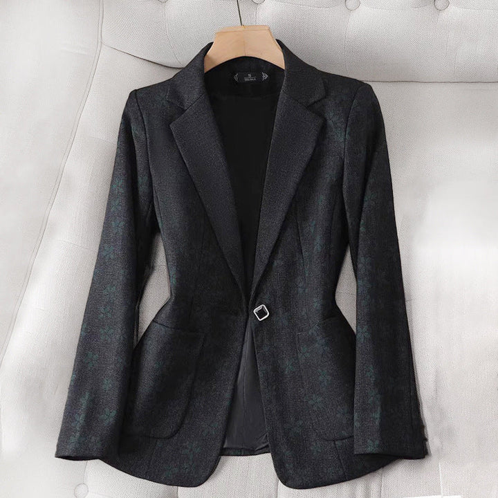 Chic women's black grid pattern blazer, ideal for business casual or fashionable outerwear.