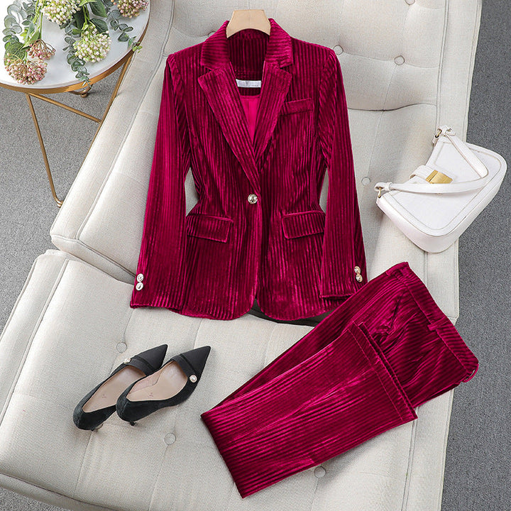 Elegant women's tailored long black blazer and matching pant suit set, perfect for professional wear and business fashion.