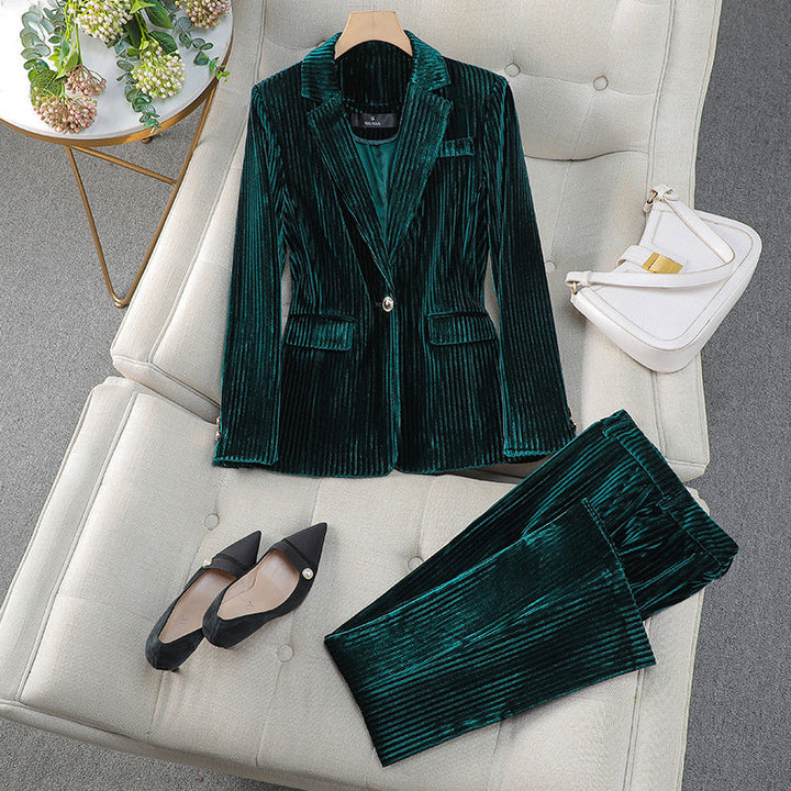 Professional women's pant suit set with a sleek long blazer, showcasing an elegant and modern business aesthetic.
