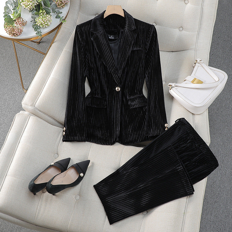 Chic women's tailored long blazer and pant suit in a classic design, suitable for versatile formal and office attire.