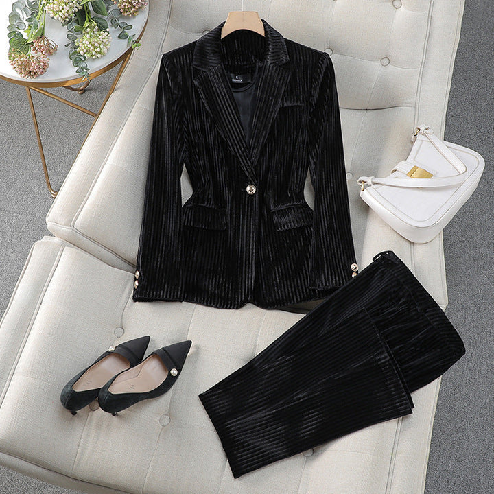 Chic women's tailored long blazer and pant suit in a classic design, suitable for versatile formal and office attire.