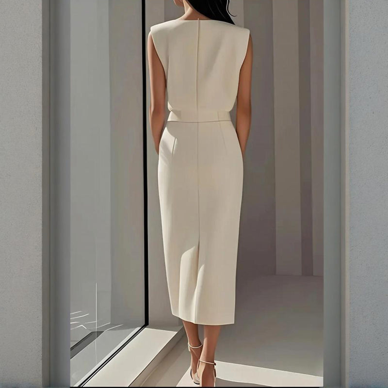 Sophisticated women's tailored midi dress, featuring unique side buttons & a stylish split hem for parties.