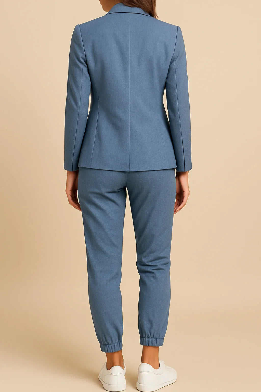 Graceful women's tailored beige suit, two-piece blazer and pants set for a polished look.