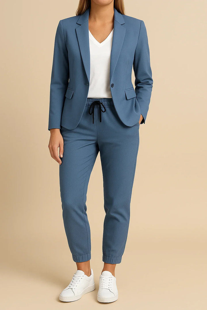 Versatile women's tailored blush pink suit, two-piece set for stylish spring formal wear.