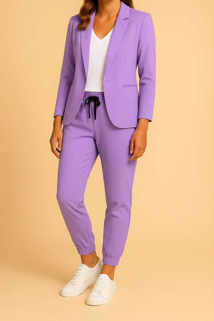 Chic women's tailored pinstripe suit, a two-piece blazer and pants set for contemporary business.