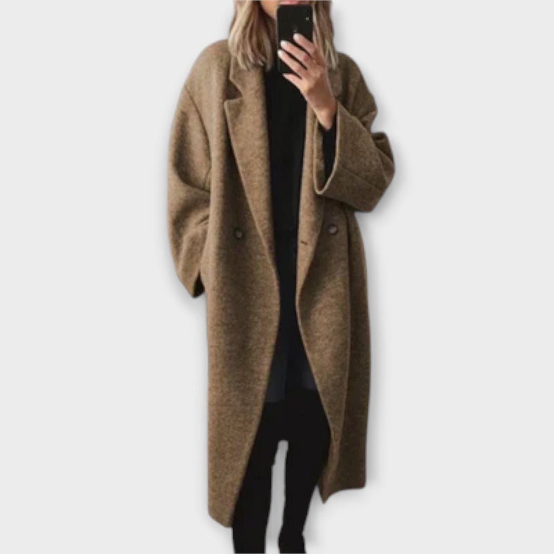 Stylish long tailored women's coat, a warm and fashionable outerwear piece for winter