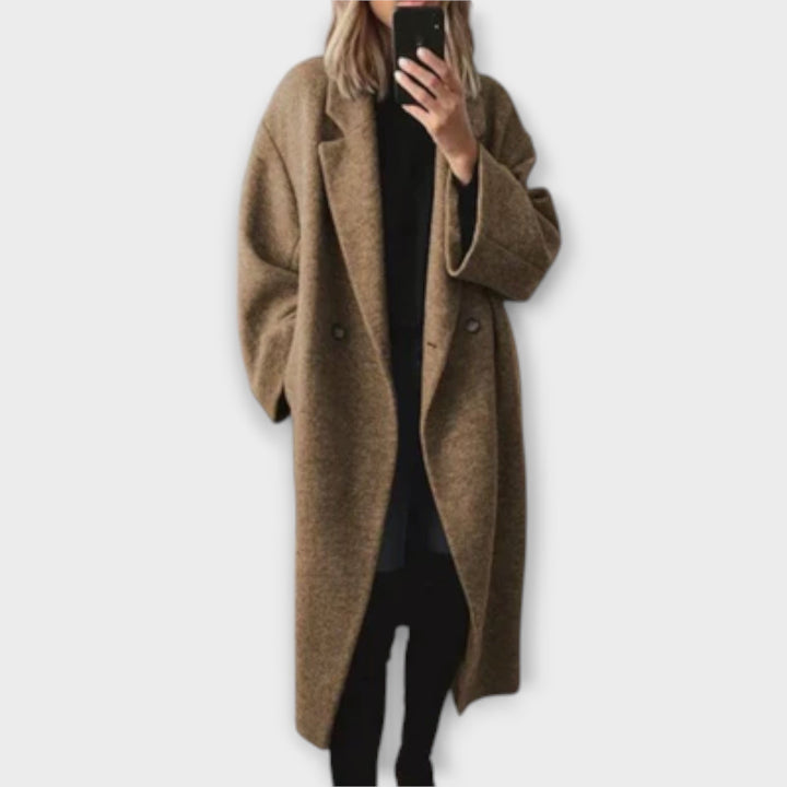 Stylish long tailored women's coat, a warm and fashionable outerwear piece for winter