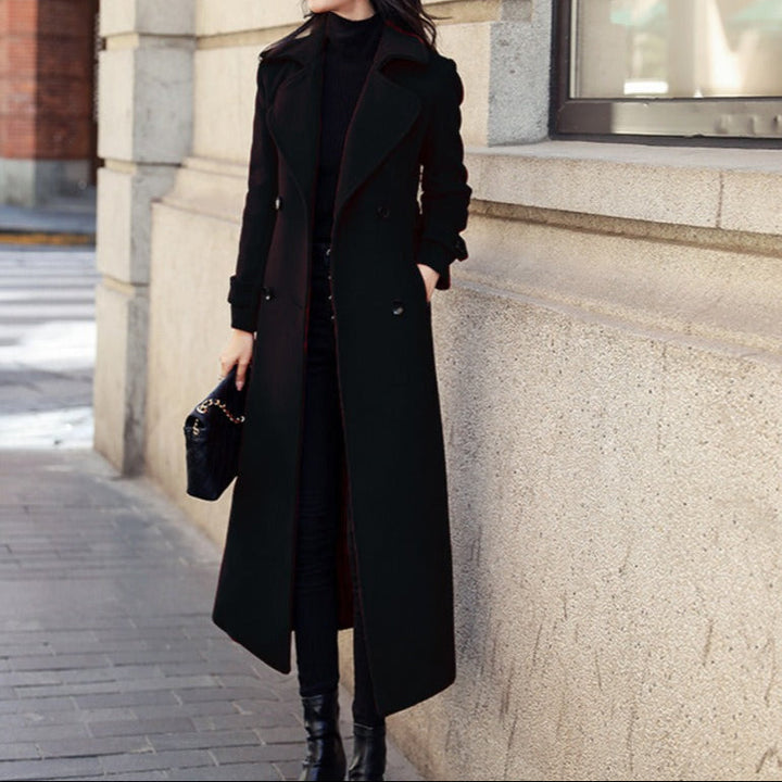 Women's stylish jacket: elegant textured fabric, double front, long sleeves, and functional pockets.