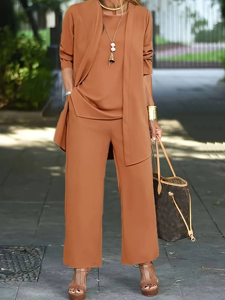 Chic polyester blend women's pantsuit set, a new and versatile three-piece for any occasion.