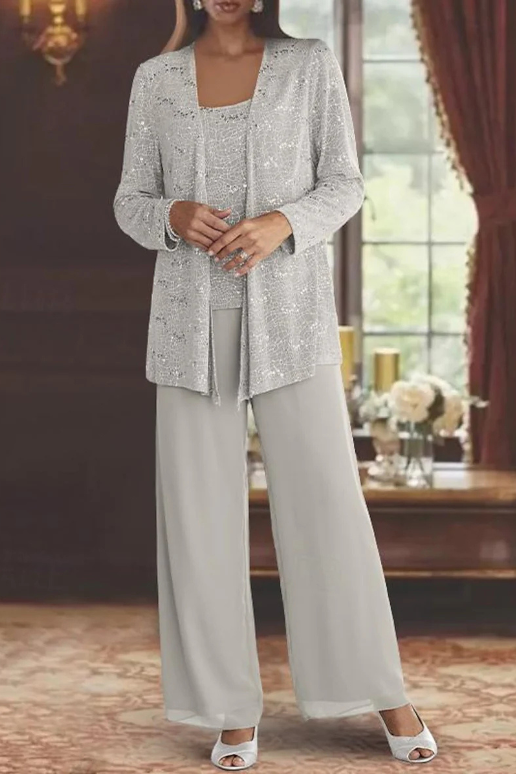 Sparkling sequin jacket, part of a three-piece formal trouser suit for wedding guests and special occasions.