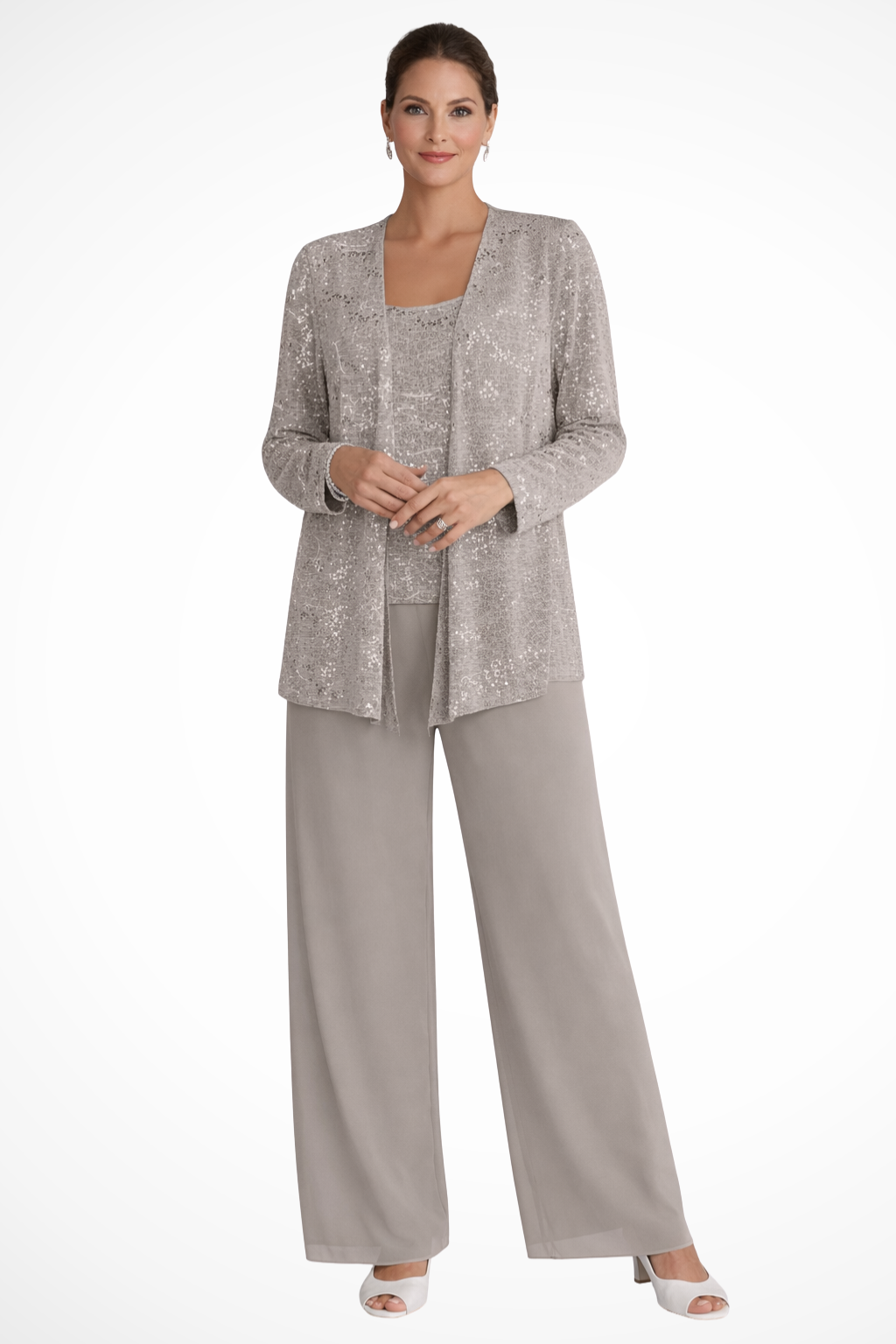 Close-up of shimmering sequin detail on jacket & delicate lace texture on wide-leg trousers of suit.