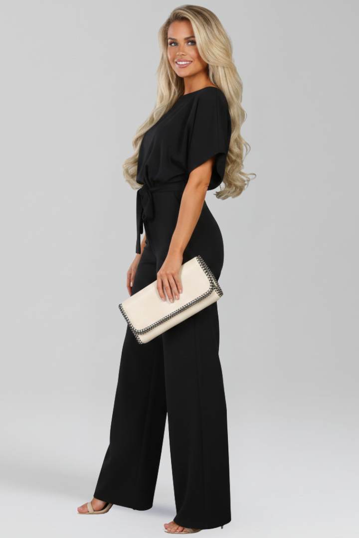 Sophisticated women's jumpsuit featuring a flattering wide-leg and adjustable tie-belt