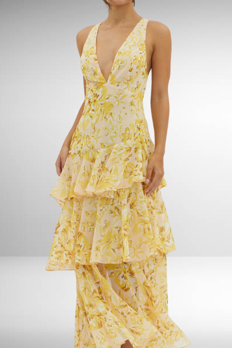 Fashionable women's spring floral tiered maxi dress, offering a comfortable and elegant look.
