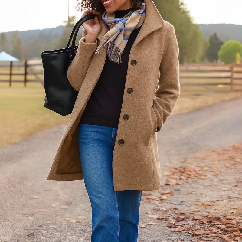 Stylish women's long button-up coat in a timeless design, perfect for winter jacket fashion