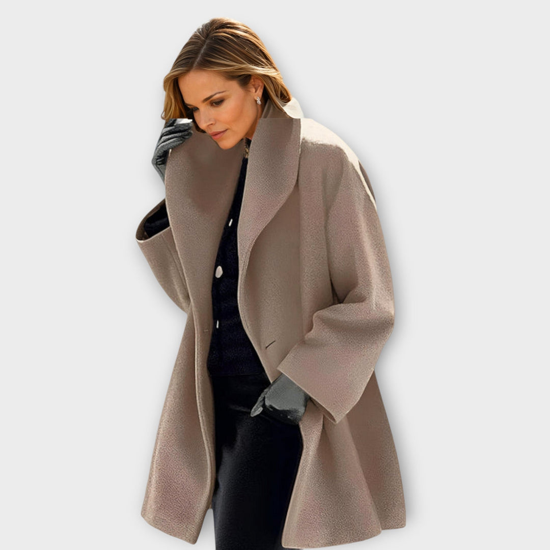 Chic women's transitional jacket with sleek design. Elegant outerwear for versatile year-round fashion.