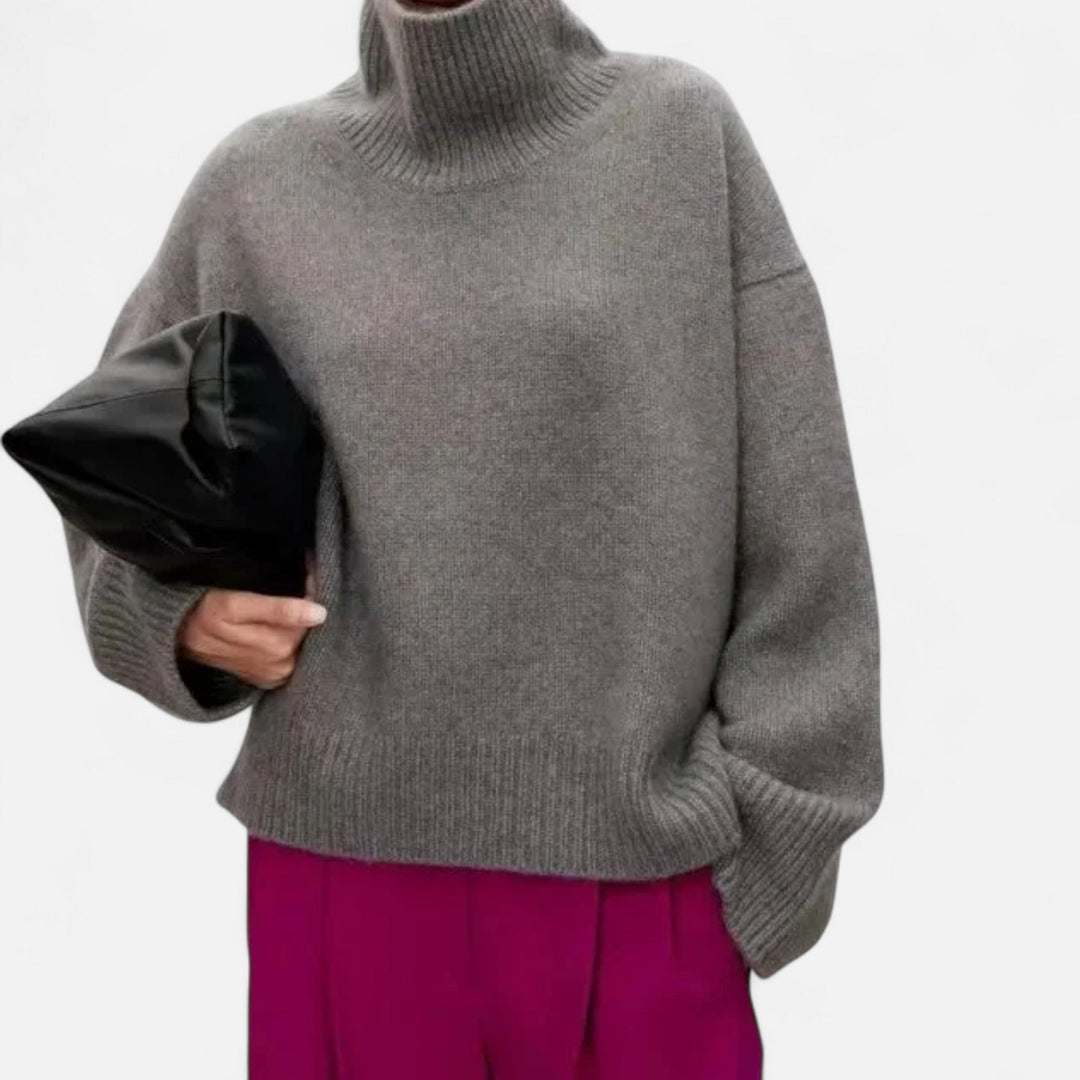 Beige women's turtleneck sweater. Cozy, classic long sleeve knit for elegant winter fashion & comfort.