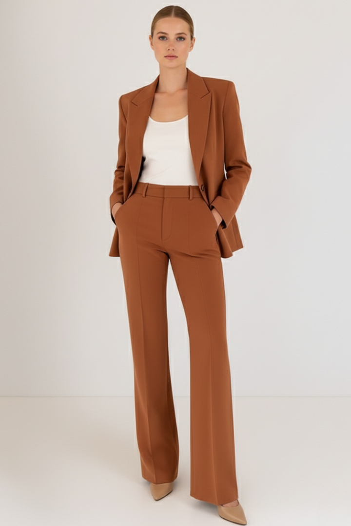 Fashionable women's elegant blazer & straight leg trouser suit set for professional business and formal wear.