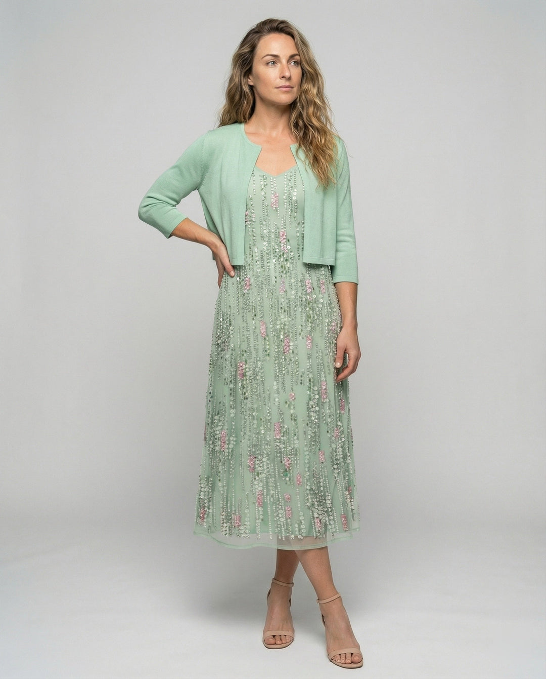 Elegant women's two-piece floral midi dress, perfect for summer occasions. Chic green pattern, fashion-forward style.