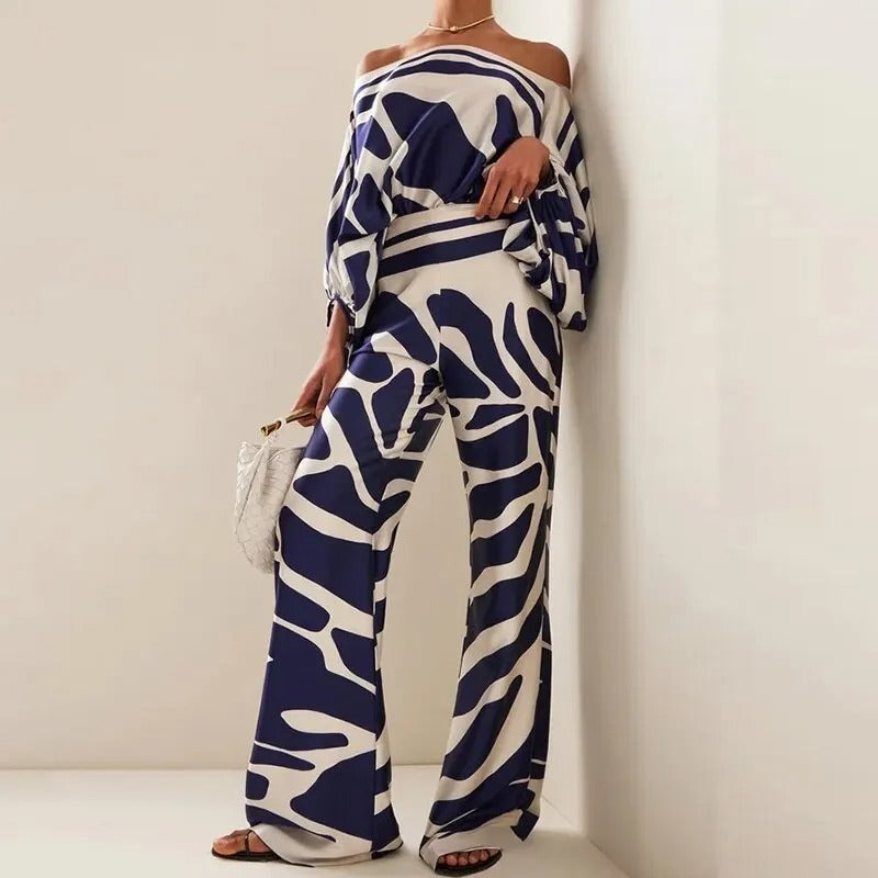 Elegant women's two-piece suit set in a refined style, offering lightweight comfort for chic coordinated fashion.
