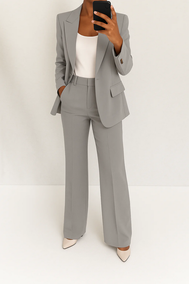 Professional women's blazer and matching trousers set. A chic, coordinated two-piece business attire for women.