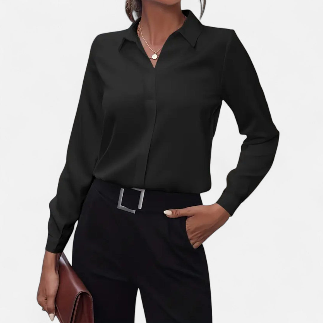 Elegant women's V-neck button-up blouse, perfect for versatile office wear or smart casual spring fashion.