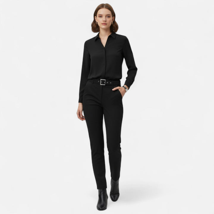Stylish women's V-neck button-up shirt in a soft fabric, ideal for a casual chic look or business attire.