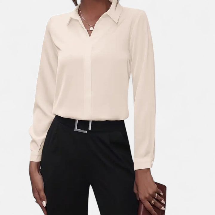 Sophisticated women's button-up V-neck blouse with long sleeves, great for elegant smart casual fashion.