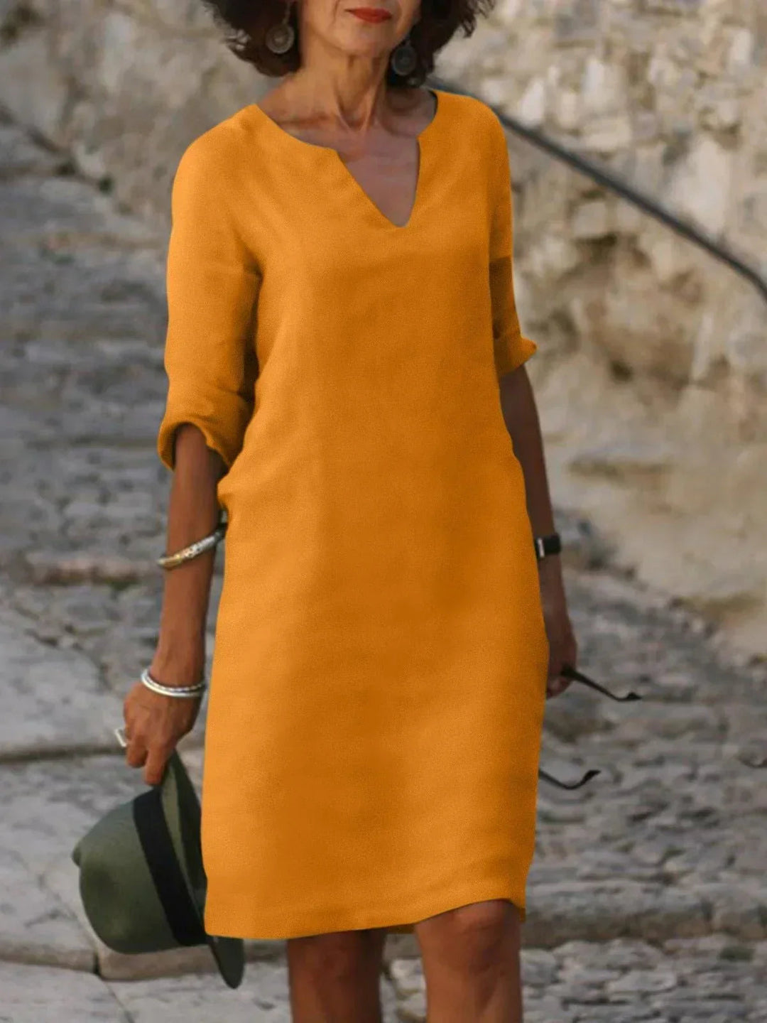 Beautiful women's elegant V-neck dress. Ideal for formal events, evening wear, or special occasions.