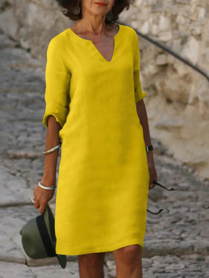 Stylish women's V-neck formal dress. A versatile choice for wedding guests, evening wear, and special events.
