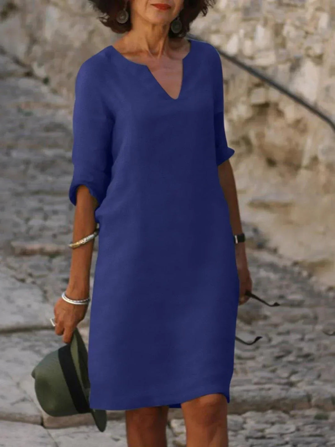 Elegant and comfortable V-neck dress for women. Perfect for formal events, weddings, or a summer evening.